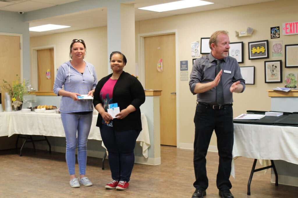 Person receiving an award.