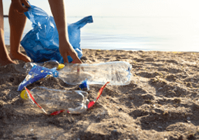 Cleaning up a beach.