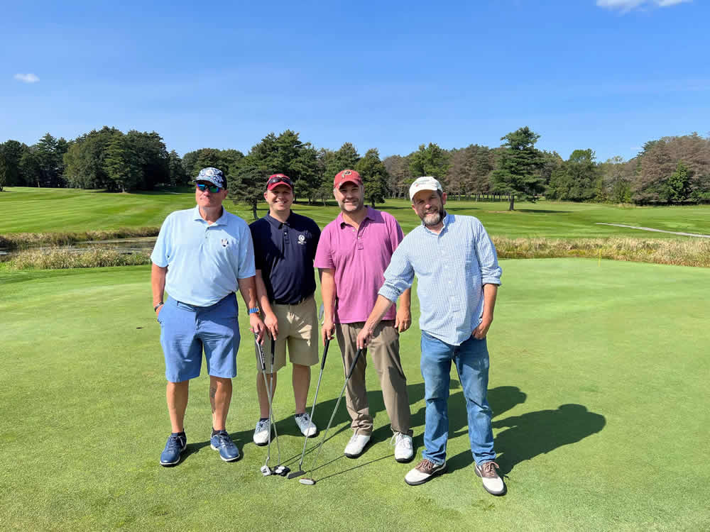 Golfing team at the Annual Charity Golf Tournament.